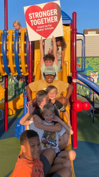 Shaker students display a Stand Up For Shaker Schools sign for a photo created by the Committee for Shaker Schools. The committee published the photo and a message Nov. 5 to emphasize what Shaker Heights residents can do together. "Yesterday, the Shaker Heights community demonstrated why our school district is so special. While powerful forces attack and demonize public education, you stood strong in defense of our schools, our children and our community. Because of you, Shaker schools will be able to maintain the people and programs that set our district apart. Our community will continue to be known for the schools it keeps. And for that, we thank you."