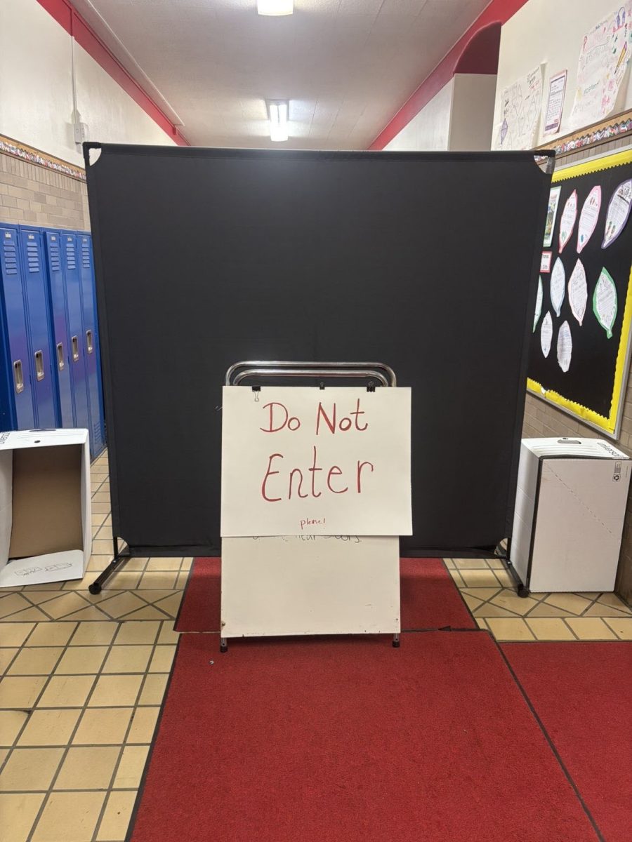 A makeshift barrier deters staff and students from entering the wing of Lomond Elementary School that has structural damage. 