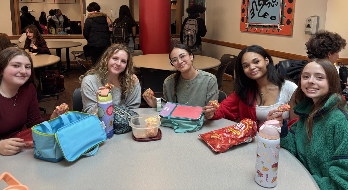 Sophomores Ruth Becker, Maggie Shefcheck, Saya Walters, Ava Mason and Rose West share cereal bars on Mar. 19 during lunch. Said Mason, “I cant wait for it to be spring break and never come back ever again.”
