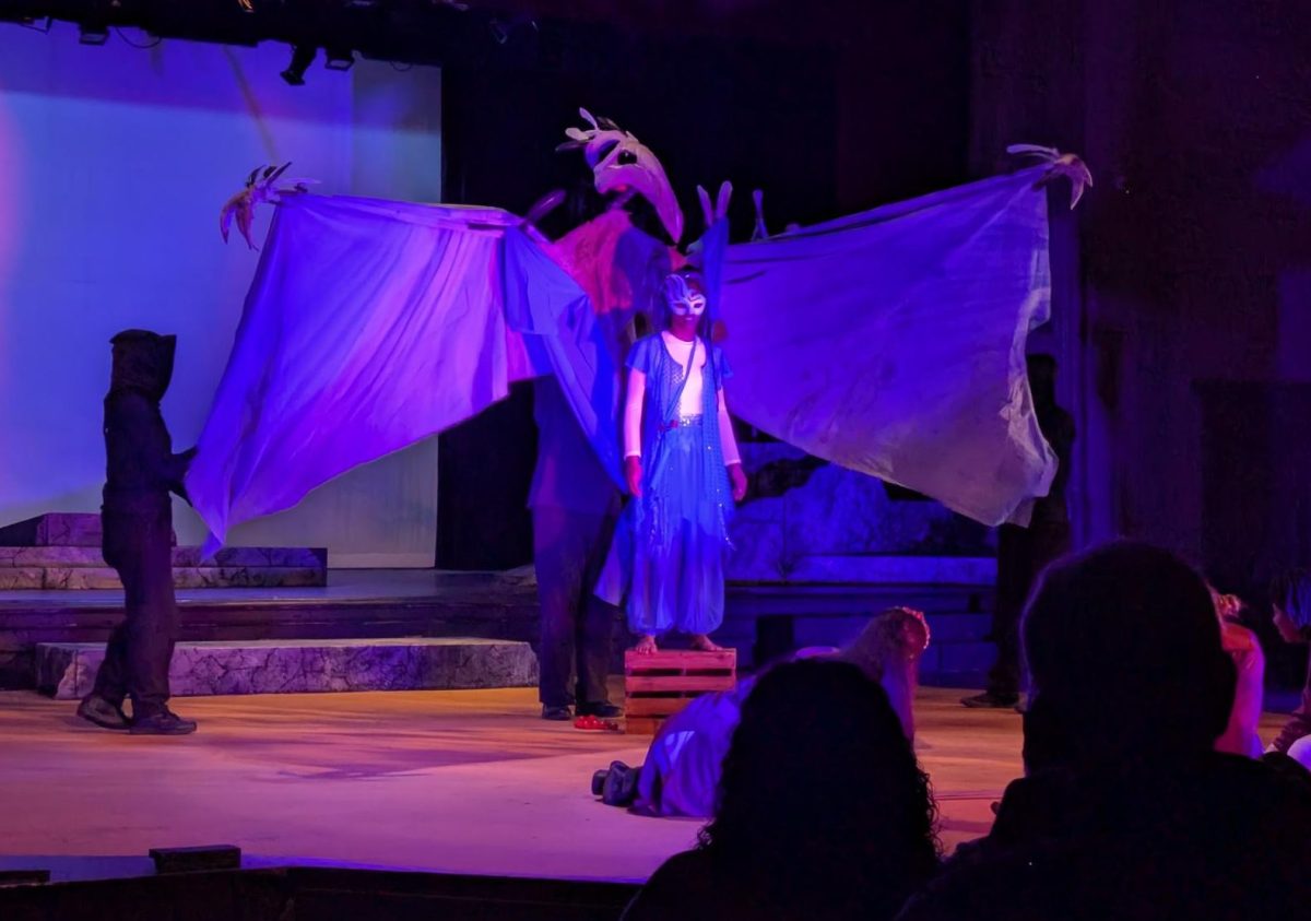 Junior London Atchison performs as the spirit Ariel in the Theatre Department's March 12 production of Shakespeare's The Tempest. "This is my first time ever doing a Shakespeare production," Atchison said. Despite its challenges, she said she has had an incredible time working on the show. "It's the language that makes it really hard to work on."