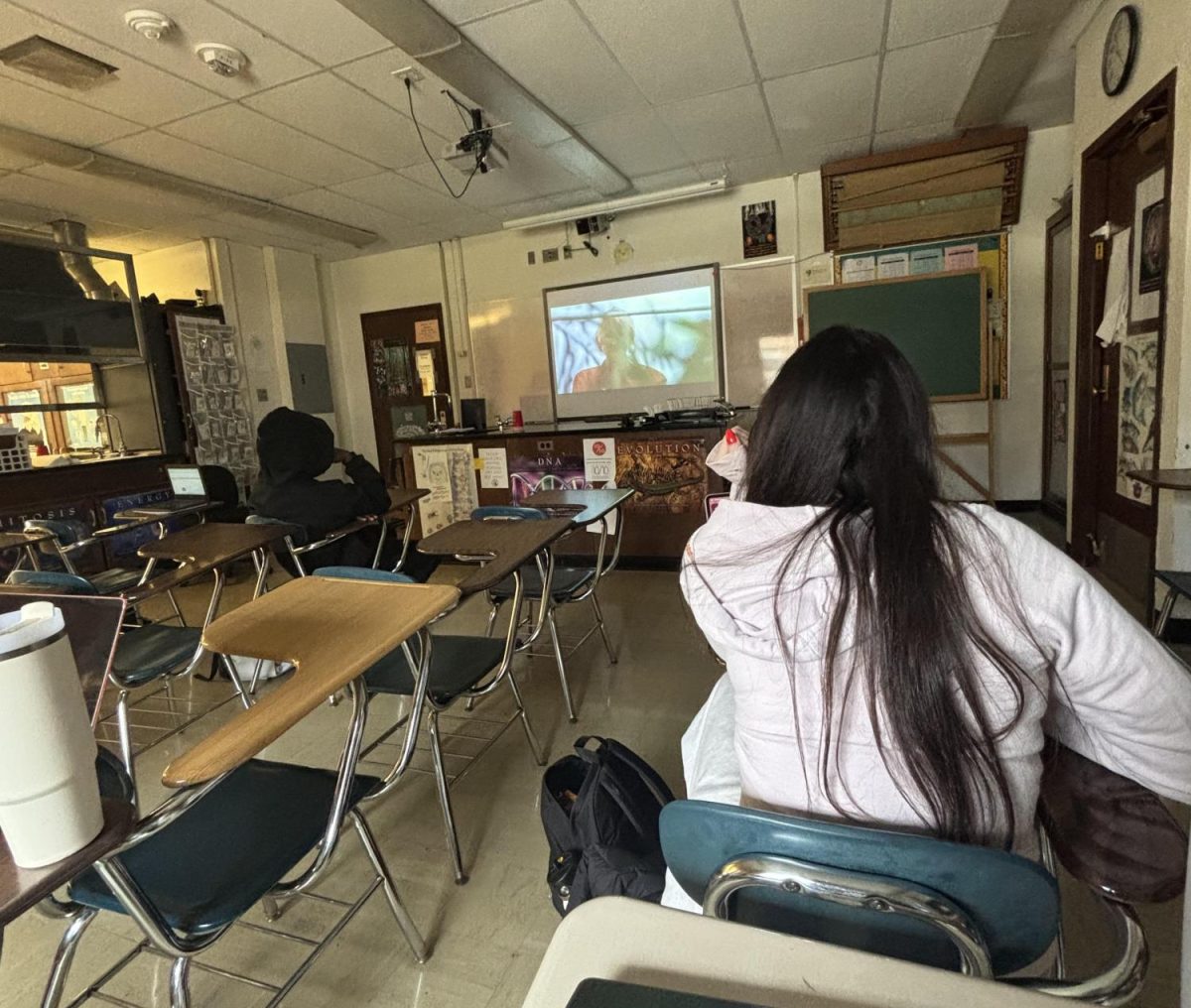 Science teacher Chelsea Stiles' 4/5 period class watches Jurassic Park whilst learning about DNA and species revivalism in room 177 on March 19th. Sophomore Lucia Peron said the movie helped her understand the biology subject more. Said Peron, "Watching the beginning of this movie helped me understand what we are learning better and changed my perspective on extinct species."
